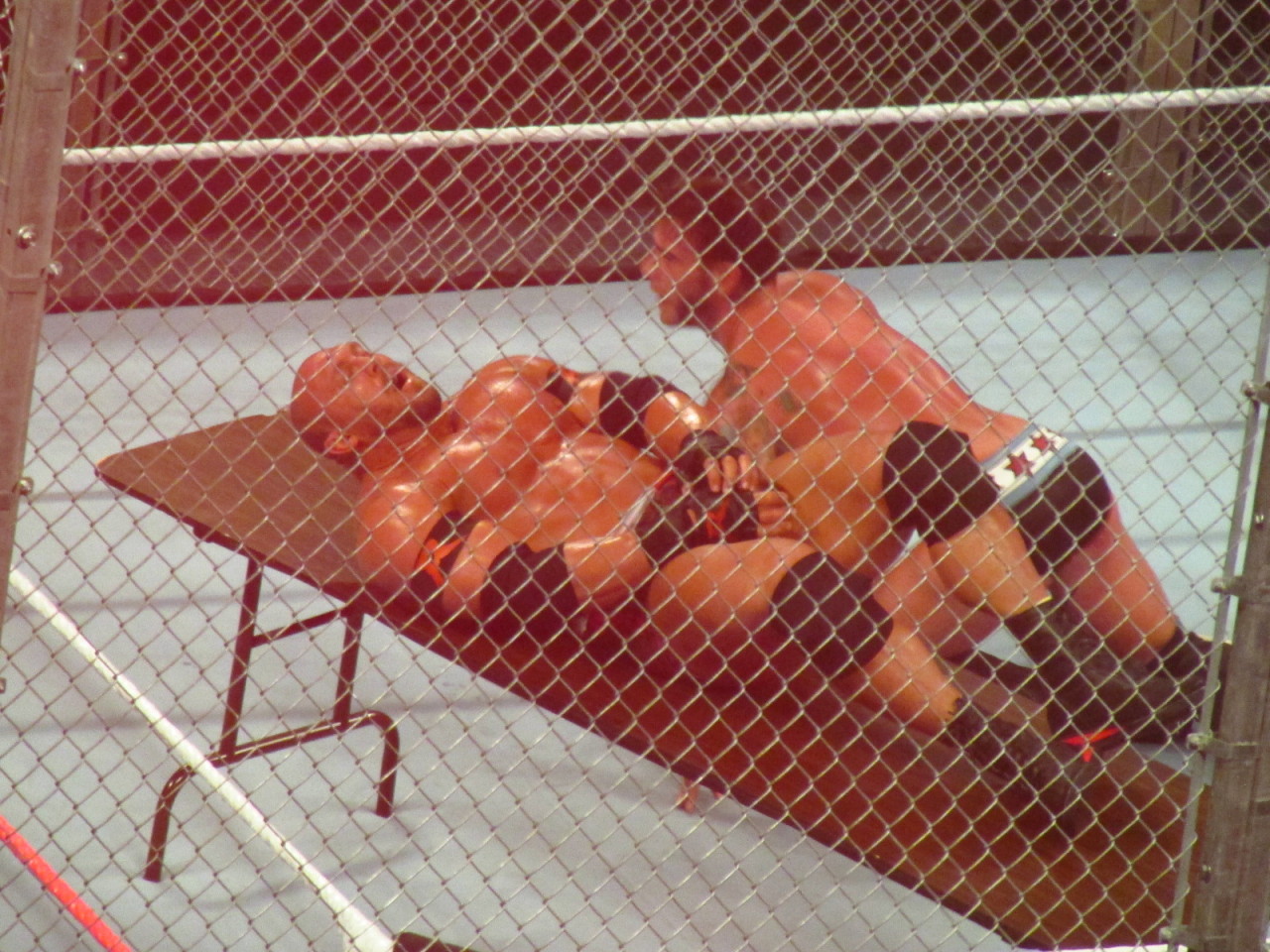 Ryback with those straps down lying on the table!! So hot!