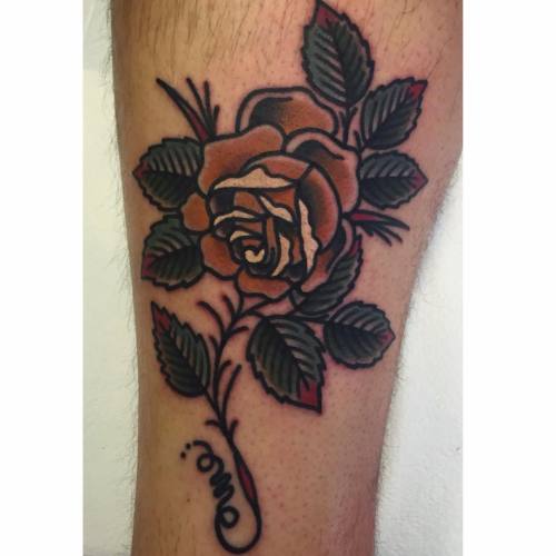 Big ass bold, traditional rose tattoo on our friend Mike’s tree trunk of a leg. Done by Nichol