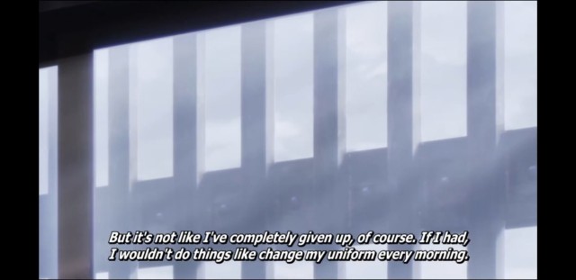 A picture of bars seen through a window. Subtitle: "But it's not like I've completely given up, of course. If I had, I wouldn't do things like change my uniform every morning."