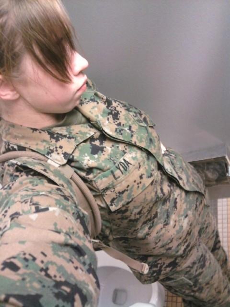 militarysluts:  Busty Marine Pvt Lyda strips naked for some selfies.