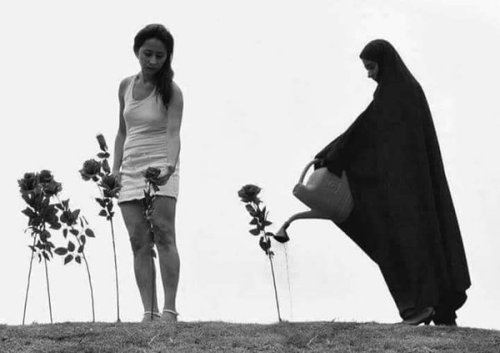 garboskank: farsizaban:  Two Iranian women in Tehran plant trees and water flowers during national a