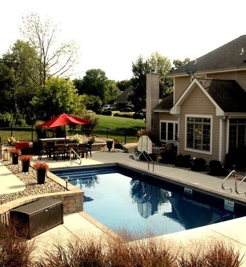 Fire Pit PatioInspiration For A Mid-sized Coastal Backyard Concrete Patio Remodel With A Fire Pit And