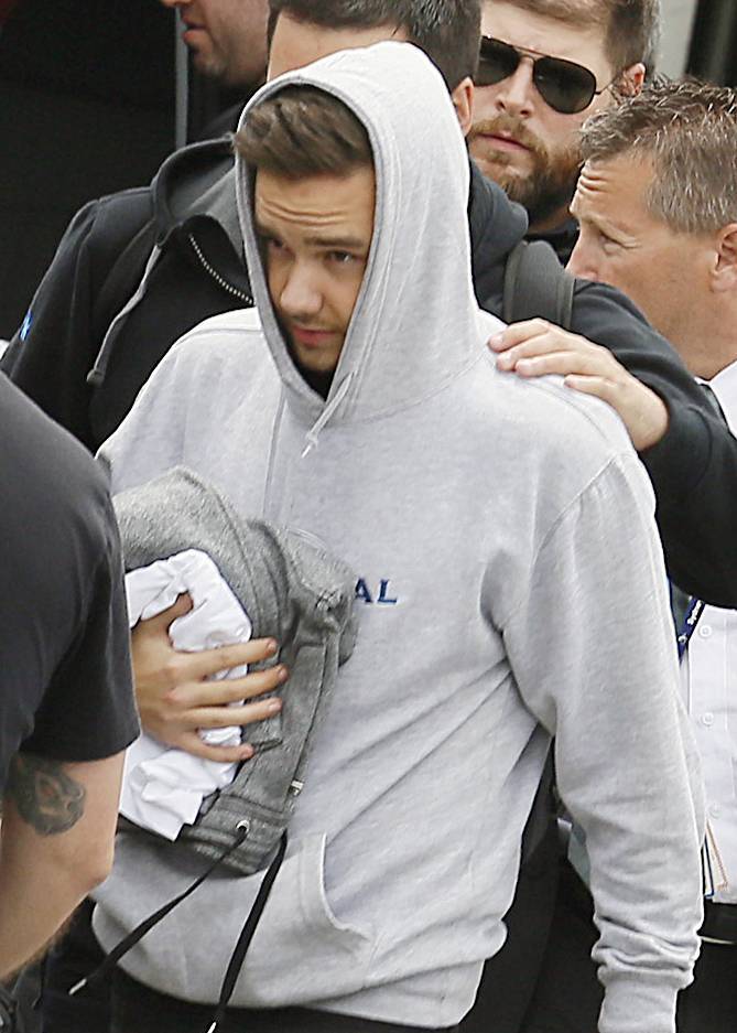 direct-news:  HQ’s - Louis, Liam and Niall arriving at Sydney Airport. 25/11/14