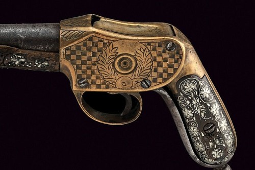 An interesting engraved and decorated martini single shot pistol. I’m not sure what the proven