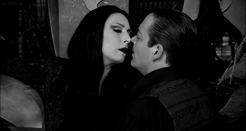 cosmic-noir: mortisia:  Morticia and Gomez Addams Their love is ICONIC!!!  Morticia: Don’t torture yourself, Gomez. That’s my job.    Their love is so special. 