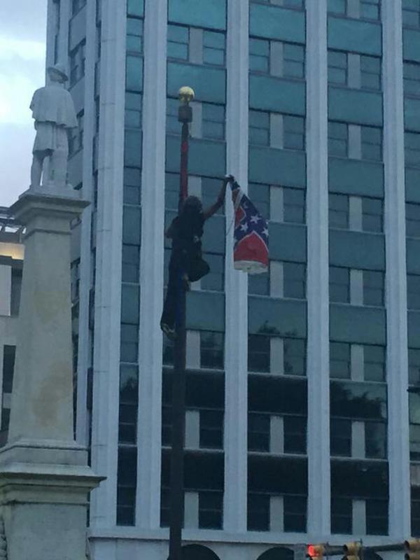 Brittany “Bree” Newsome, a BLACK WOMAN, removes the confederate flag!