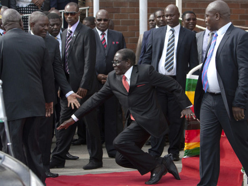 stunningpicture:Robert Mugabe, the dictator of Zimbabwe and all around asshole, is trying to suppres