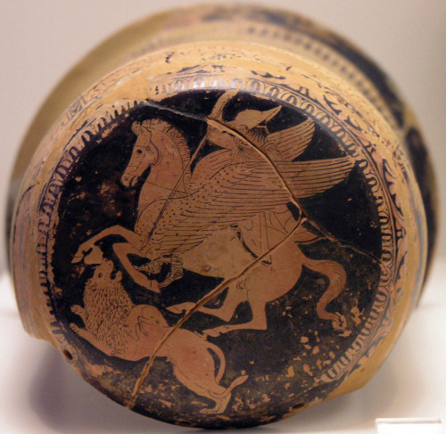 Bellerophon, astride Pegasus, attacks the Chimera.  Attic red-figure epinetron (thigh-protector worn