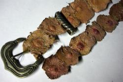 uglytreemugger:  traumatic-plastic:  Serial Killer Ed Gein’s belt that was made from human nipples.  weirdgiraffes