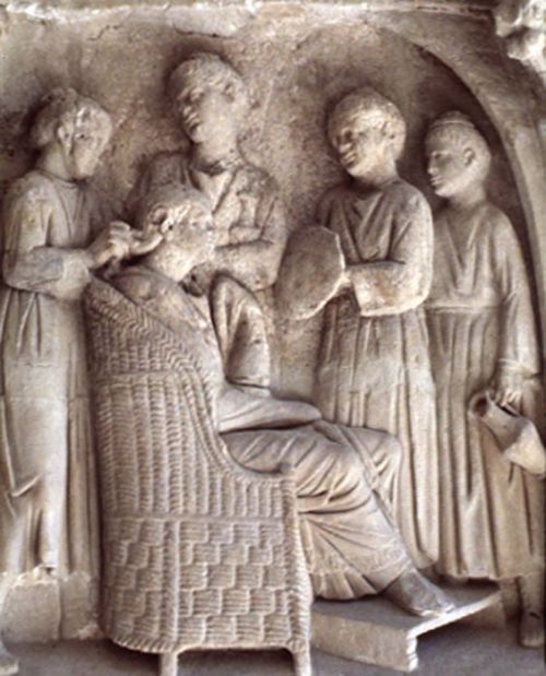 Relief depicting a Roman woman and her servants