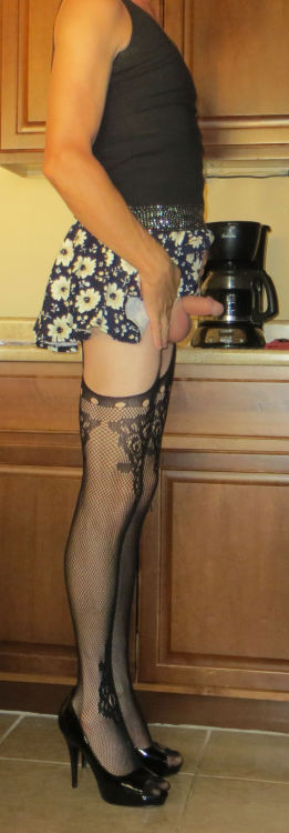 yoursissyfag: little sissygurl loves playing in her short flowery skirt and lacy fashion stockings