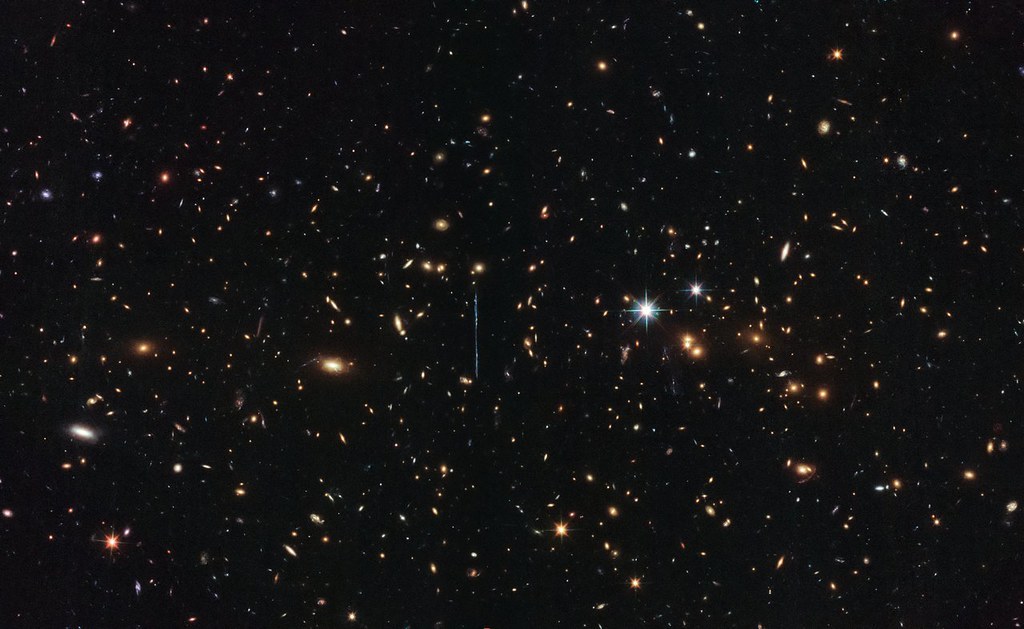 Hubble Weighs in on Mass of Three Million Billion Suns by NASA Goddard Photo…
