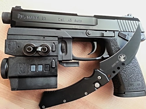 gunrunnerhell:  HK MARK 23 Currently the largest and most expensive production pistol on HK’s lineup, the MARK 23 is chambered in .45 ACP. Some of the most sought after accessories for the MARK 23 are from Wilcox Industries. The entire set with the