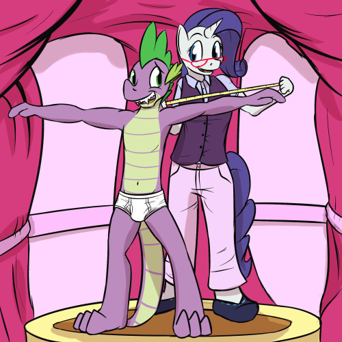 Sex Spike standing in his briefs as Rarity measures pictures