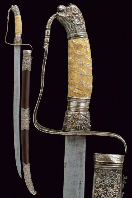 Silver mounted Vietnamese guom with mammoth ivory hilt, 19th century.from Czerny’s International Auc