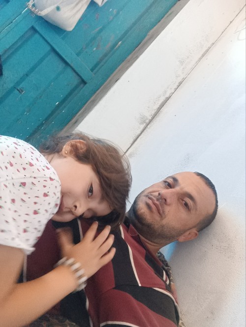 My Name Is Khaled, 41 Years Old, From Gaza. I Am The Father Of Mariam, 5 Years Old. I Was Injured In
