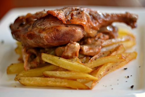 french fries, duck confit, fricassee of chanterelles with a lot of garlic and cognac.