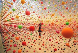 martinekenblog:  Atomic: Full of Love, Full of Wonder was a 2005 installation by artist Nike Savvas at the Australian Centre for Contemporary Art in Melbourne. The piece involved an immense array of suspended bouncy balls creating a dense field of color