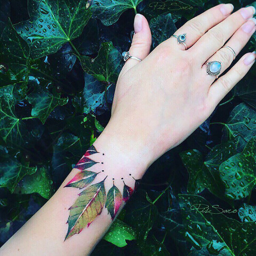 culturenlifestyle:Dainty & Ethereal Floral Tattoos by Pis Saro Crimean tattoo artist Pis Saro illustrates exquisite floral tattoos inspired by nature. Ethereal, dainty and feminine, the tattoos appear as watercolor painting on the skin. Her effortless