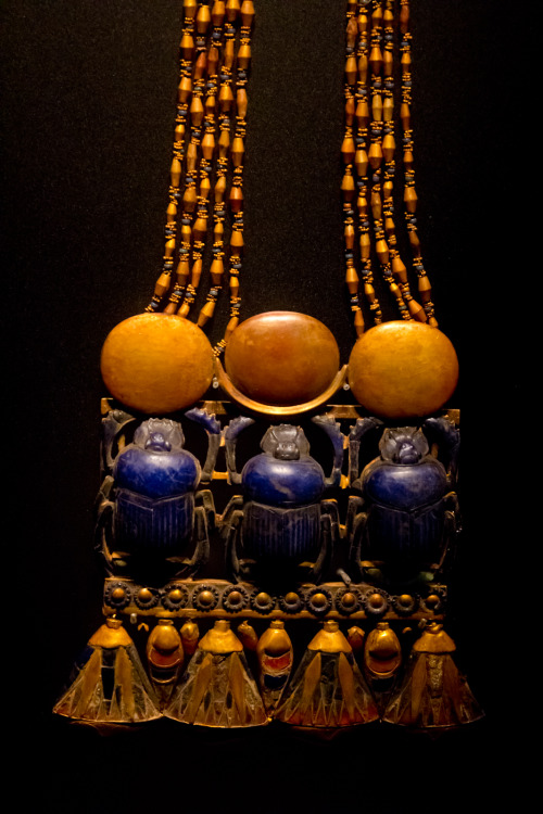 Ancient Egyptian pectoral with three scarabs (dung beetles), representing the god Khepri, who pushes