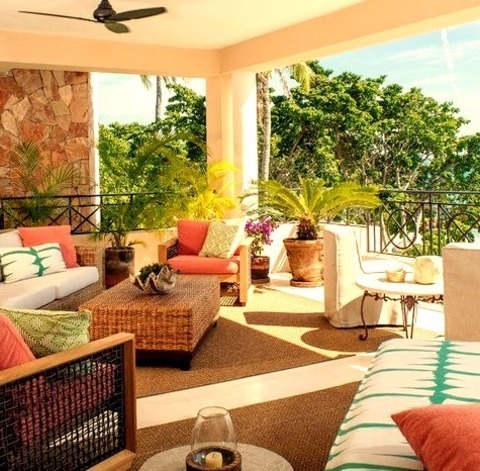 Backyard PorchAn Example Of A Large Tropical Back Porch Design With A Roof Extension.