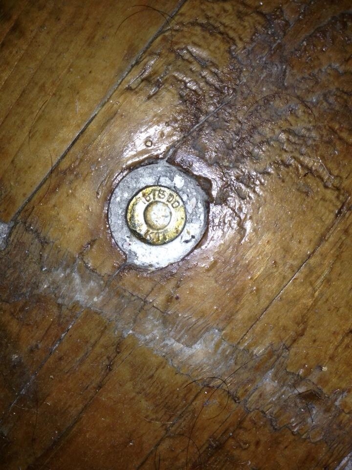 tombstone-actual:  Can Someone ID what this is? Stuck in the floorboard of my cousins