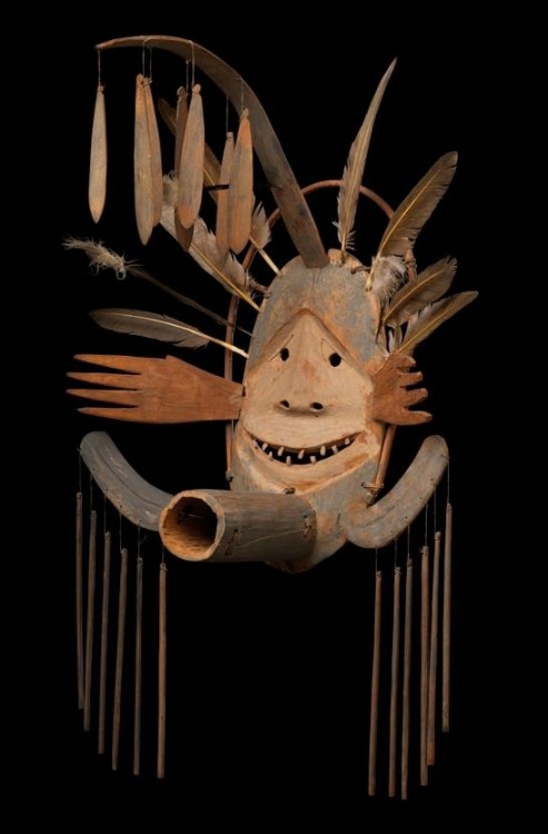 Yup’ik Masks, early 20th century, wood, feathers, rattan, paint, metal nails Collection of Glenbow M