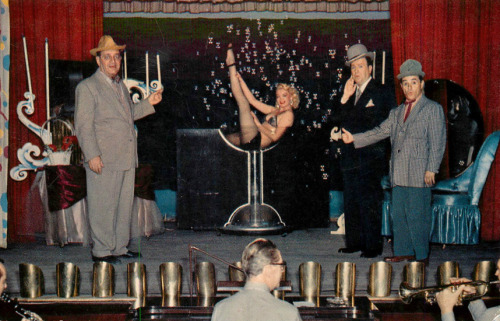 Tere SheehanPosing in her “Champagne Fantasy” glass; on stage at ’Larry Potter’s Supper Club’ in Los Angeles..