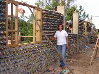 unconsumption: Did you know that you can make houses out of plastic bottles? By filling them with sa