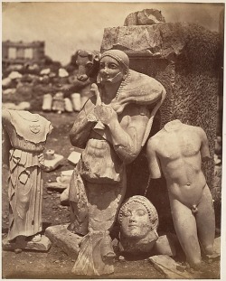 sashastergiou:    Shortly After Exhumation on the Acropolis. The Calf-Bearer and the Kritios Boy . Unknown Artist. Ca. 1865. Albumen silver print from glass negative.   