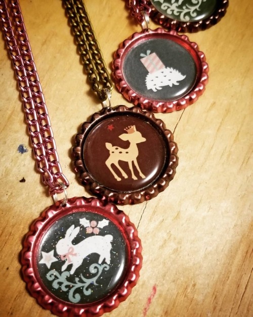 Some Christmas woodland creature necklaces I put together. I love the metallic pink color especially