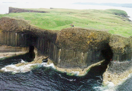 flowing-more-freely-than-wine:Fingal’s Cave, UK “Its size and naturally arched roof, and the eerie sounds produced by the echoes of waves, give it the atmosphere of a natural cathedral. The cave’s Gaelic name, An Uaimh Bhinn, means ‘the melodious