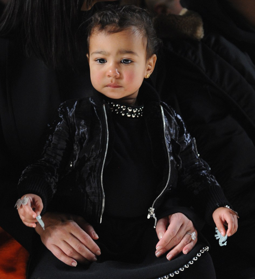 kimkardashianfashionstyle:February 14, 2015 - Kim Kardashian & North West at the Alexander Wang Fall 2015 Fashion Show in NYC.   