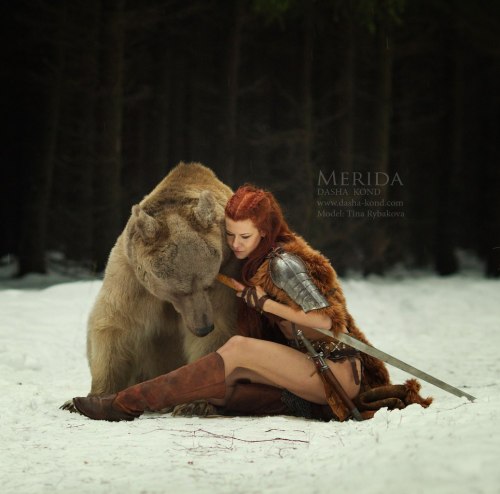 anacane:  sakafai:  OMG! Incredible “extreme” cosplay called Merida by the model Tina Rybakova. Photo by Dasha Kond  ”I need a bear for my cosplay. You need a what? A bear. 5 years, an exotic pet license, and 15,000 dollars later we get this.