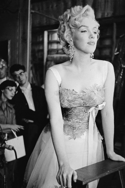 missmonroes:Marilyn Monroe watching the filming of Desiree, while in costume on a break from shooting There’s No Business Like Show Business (1954)