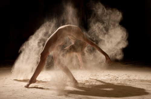 adventuresinhires:  Poussière d’étoiles (Stardust) is a series produced by the French photographer Ludovic Florent. It showcases dancers brimming with adding flour. Sand grains accentuate the majestic movement choreography. 