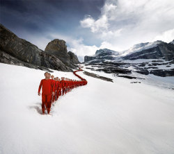 cubebreaker:  Hundreds of mountaineers collaborated on this photo shoot in the Alps with Robert Bösch, which culminated with the climbers lighting up the route taken by Edward Whymper during the Matterhorn’s first ascension 150 years ago.