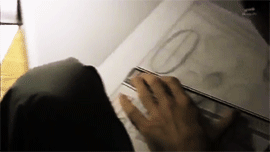  Isayama Hajime inking his chapter 52 manuscript + the finished page (Via MangaStream)