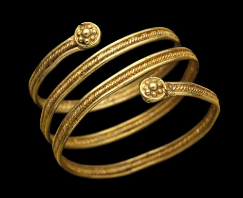 An Etruscan Gold Spiral gold ring circa 7th Century BC.  The Etruscans were a people who dominated c