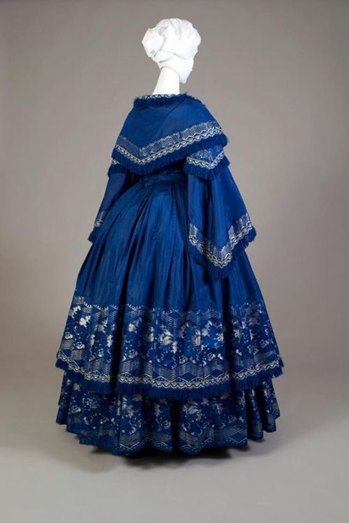 fashionologyextraordinaire: Royal blue silk taffeta dress trimmed with floral jacquard ribbon and fr