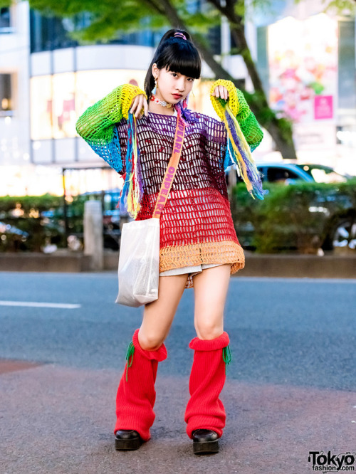 15-year-old Japanese student Yoh on the street in Harajuku wearing a colorful look with a vintage kn