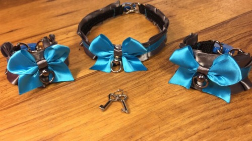 Matching collar and cuffs with locks and sets of keys