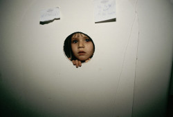 usherss: ‘That little one peeping through the hole reminds me so much of myself, hiding but wanting to see’ Photograph: Nan Goldin 