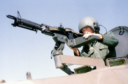 ofspacifica:  Osan Air Base, South Korea 1980Korean 1LT Lee Young Nam operates an M-60 machine gun on an armored personnel carrier (APC).