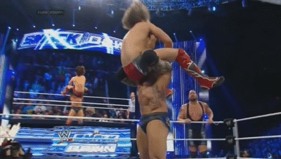 Batista getting a face full of Daniel’s crotch