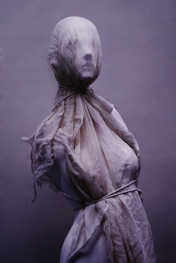 qarcon:  A quick thing I just did in art Mannequin wrapped in cotton and string against a white wall 