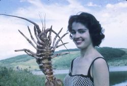 nemfrog:  Diver Heather McEwen holds a crayfish. August 1962. Archives Canada. 