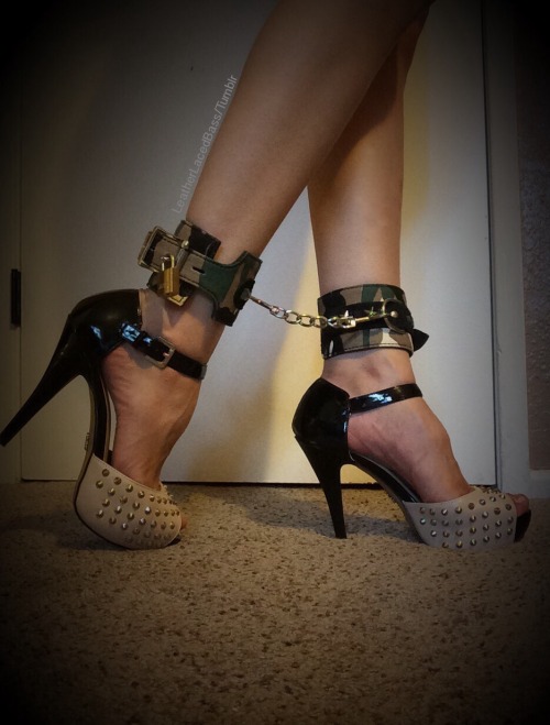 leatherlacedbass: Keep your slave sexy, shackled and at your service. ʚ♡⃛ɞ  Camo star and blue rabbit fur cuffs from theblackroomlasvegas Please keep caption 