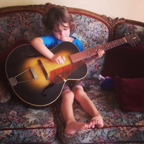 Boone picking his grandpa’s 1945 Epiphone Zenith.