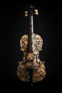 sixpenceee:  The above is a violin with carved